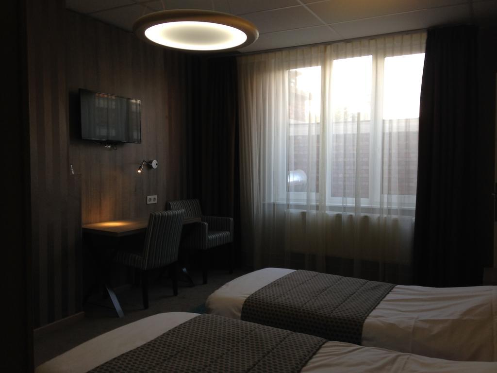 Hotel Mille Colonnes Lovaina Habitación foto